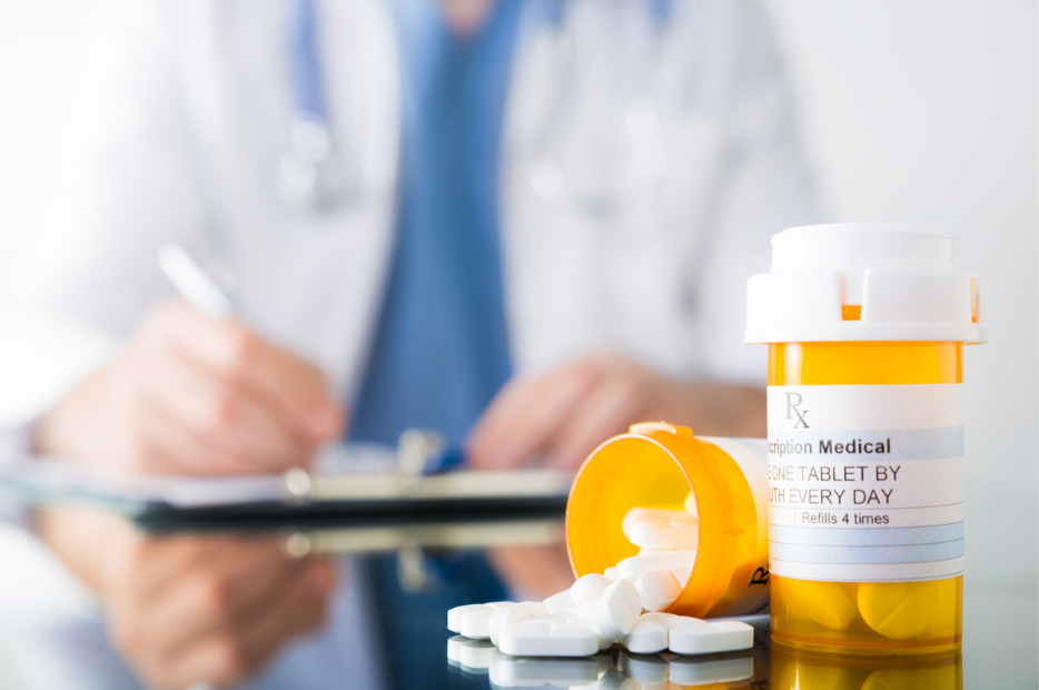 doctor writing a prescription